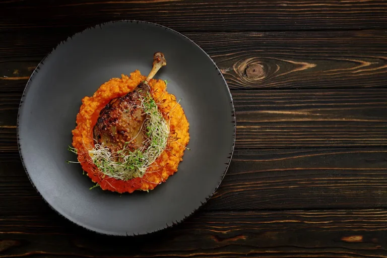 creamy beetroot risotto and duck legs